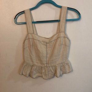 Cream crop top with black stitching